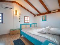 Postel nebo postele na pokoji v ubytování Holiday Home Mickey by Interhome