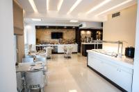 A television and/or entertainment centre at Lagaria Hotel