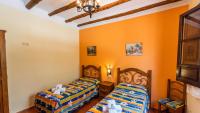 Posteľ alebo postele v izbe v ubytovaní Nuestra Finca Rural Orgiva by Ruralidays