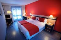 Postel nebo postele na pokoji v ubytování Ibis Styles Zaragoza Ramiro I