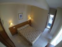 Hotel Tamasiteにあるベッド