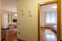 Televízia a/alebo spoločenská miestnosť v ubytovaní Residence Stefenine