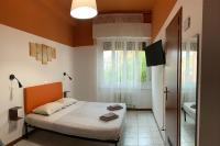 Posteľ alebo postele v izbe v ubytovaní marconi 22 rooms