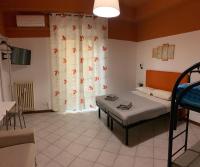 Posteľ alebo postele v izbe v ubytovaní marconi 22 rooms