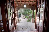 an open door of a house with a hallway at Hostal El Cortijo in Algodonales