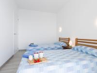 Postel nebo postele na pokoji v ubytování Holiday Home Jeroni Pau by Interhome