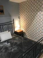 Posteľ alebo postele v izbe v ubytovaní MOTEL KATERINA