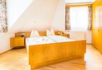 Posteľ alebo postele v izbe v ubytovaní Pension Appartements Gabriele