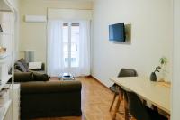 A television and/or entertainment centre at Newly Renovated Athenian Apt with Balcony