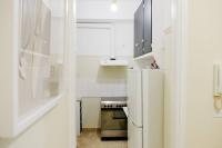 A kitchen or kitchenette at Newly Renovated Athenian Apt with Balcony