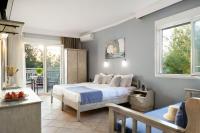 Posteľ alebo postele v izbe v ubytovaní Hotel Sirines Complex