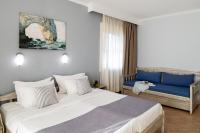Posteľ alebo postele v izbe v ubytovaní Hotel Sirines Complex