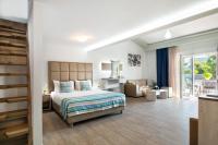 Posteľ alebo postele v izbe v ubytovaní Hotel Sirines Complex
