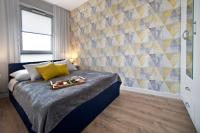 Posteľ alebo postele v izbe v ubytovaní P&O Corporate Serviced Apartments Cybernetyki