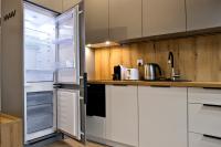 Kuchyňa alebo kuchynka v ubytovaní P&O Corporate Serviced Apartments Cybernetyki