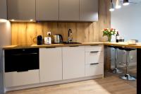Kuchyňa alebo kuchynka v ubytovaní P&O Corporate Serviced Apartments Cybernetyki