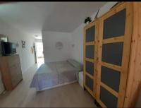 Łóżko lub łóżka w pokoju w obiekcie Casa Tavio 3