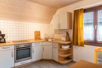 Kuchyň nebo kuchyňský kout v ubytování Familienwohnung Haus 18
