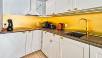 Kuchyňa alebo kuchynka v ubytovaní Apartament Triventi 48 Premium - 5D Apartamenty