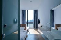 Star Hostel Taichung Parklaneにあるベッド