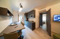 A kitchen or kitchenette at Blue Moon - Via Parigi Apartments