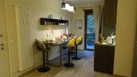 A kitchen or kitchenette at Blue Moon - Via Parigi Apartments