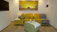 A seating area at Blue Moon - Via Parigi Apartments