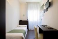 Posteľ alebo postele v izbe v ubytovaní Hotel Bellavista