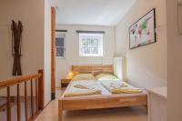 Łóżko lub łóżka w pokoju w obiekcie Apartment Peacock - Steinbock Lodges