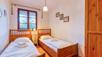 Posteľ alebo postele v izbe v ubytovaní Apartament Klimat Górski na Okrzei - 5D Apartamenty