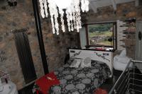Postel nebo postele na pokoji v ubytování Casas Rurales Entre Babia y La Luna