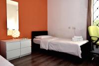 Een bed of bedden in een kamer bij City Living Suites TK1 Rm 2