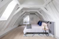 Postel nebo postele na pokoji v ubytování Kimpton De Witt Amsterdam by IHG