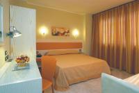 Posteľ alebo postele v izbe v ubytovaní Hotel Cristal Eboli