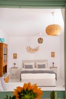 Posteľ alebo postele v izbe v ubytovaní Mando Pool Villas w Sea Views - Five Bedrooms