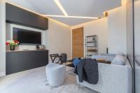 Le Dortoir Boutique Suitesにあるテレビまたはエンターテインメントセンター