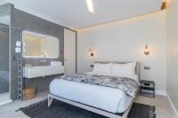 Le Dortoir Boutique Suitesにあるベッド