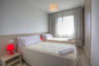 Postel nebo postele na pokoji v ubytování Sono Master Apartments