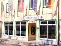 a building with flags on the side of it at Am Klostergarten in Freising