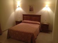 Posteľ alebo postele v izbe v ubytovaní Hotel Las Fuentes