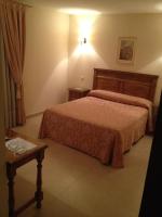 Posteľ alebo postele v izbe v ubytovaní Hotel Las Fuentes
