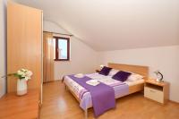Posteľ alebo postele v izbe v ubytovaní Apartments Piteša