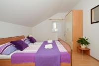 Posteľ alebo postele v izbe v ubytovaní Apartments Piteša