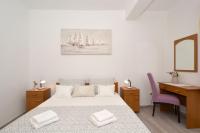 Posteľ alebo postele v izbe v ubytovaní Apartments Piteša