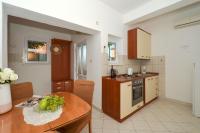 Kuchyňa alebo kuchynka v ubytovaní Apartments Piteša