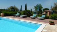 Bazén v ubytovaní Agriturismo I Romiti alebo v jeho blízkosti