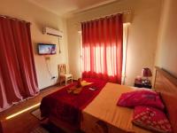 A bed or beds in a room at Joya Apartmento