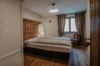 Posteľ alebo postele v izbe v ubytovaní Pradella Apartments