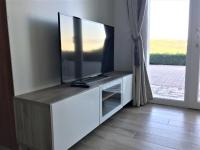 A television and/or entertainment centre at Valpolicella Hills