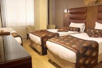 Postel nebo postele na pokoji v ubytování Marlight Boutique Hotel